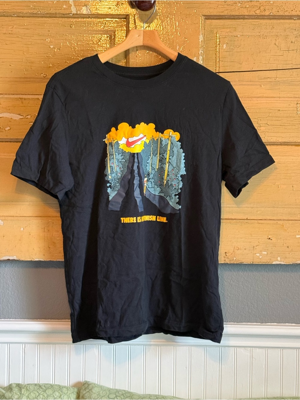 Nike Black Graphic Tee with Yellow and Blue Illustration
